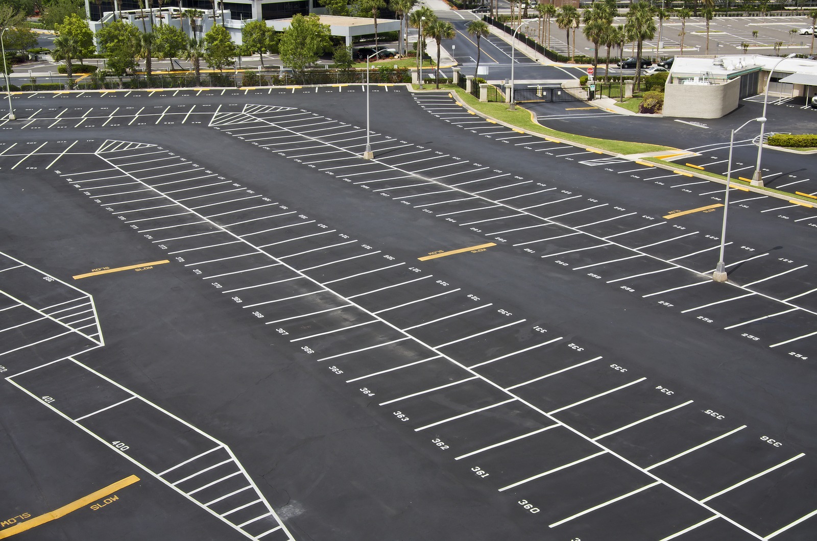 Massive freshly striped commercial parking lot