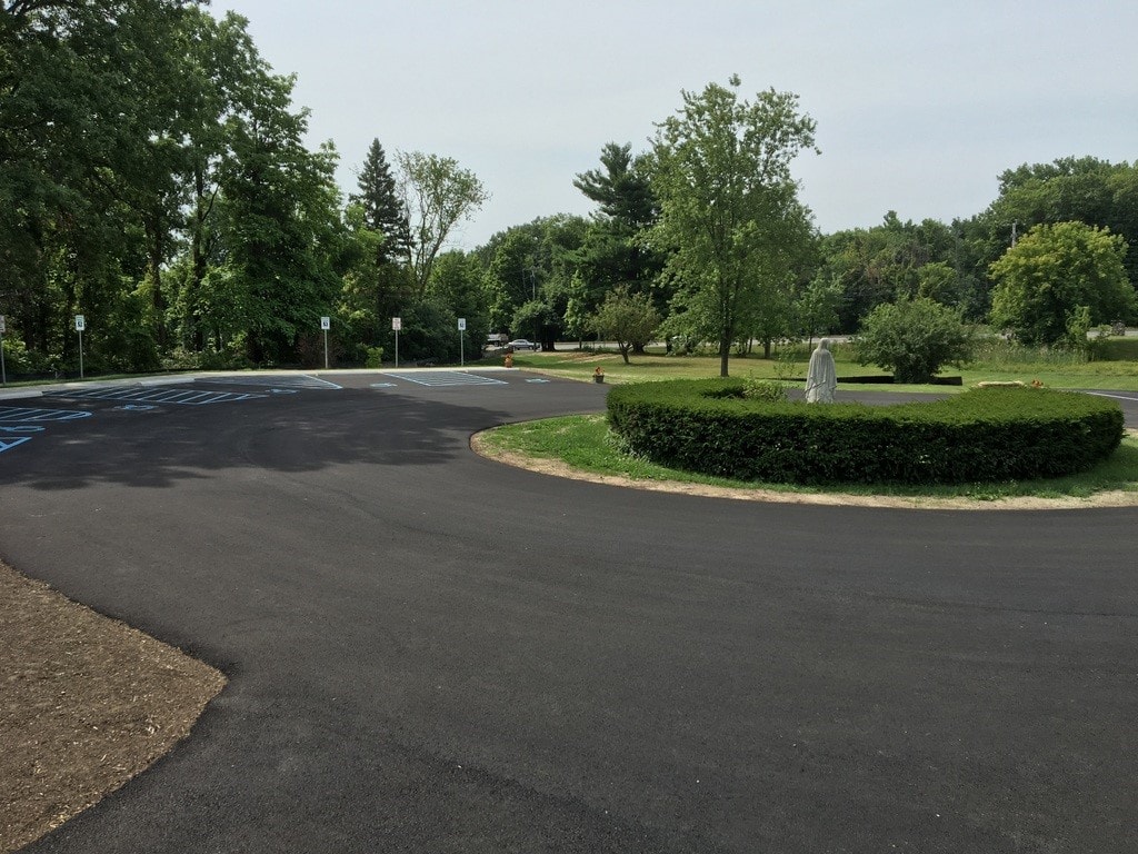 Restriped commercial parking lot at sunset